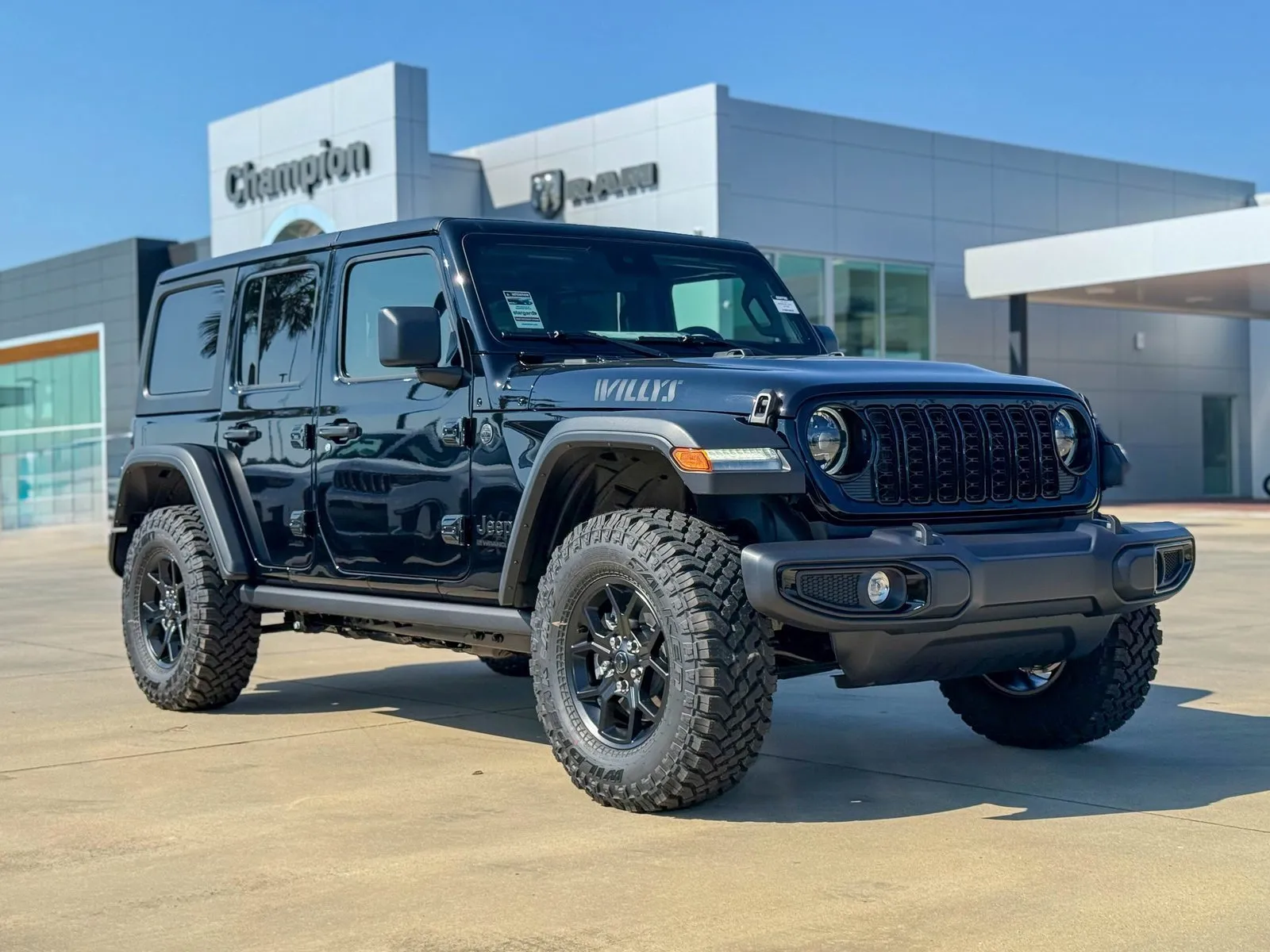 Black 2025 Jeep Wrangler Willys for sale in Gulfport, MS