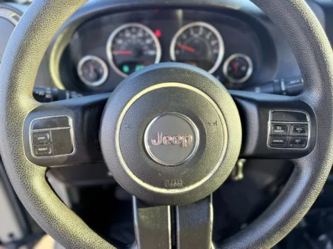 Photos of 2017 Jeep Wrangler Unlimited Sport for sale in Gulfport, MS at Champion Chrysler Dodge Jeep Ram