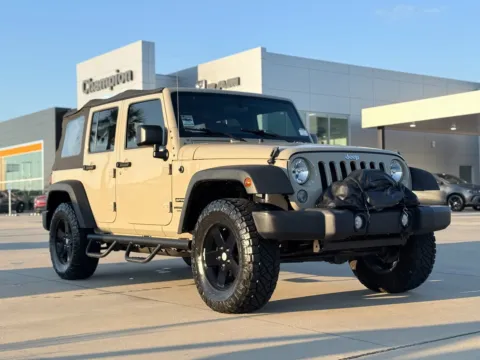 Beige 2017 Jeep Wrangler Unlimited Sport for sale in Gulfport, MS