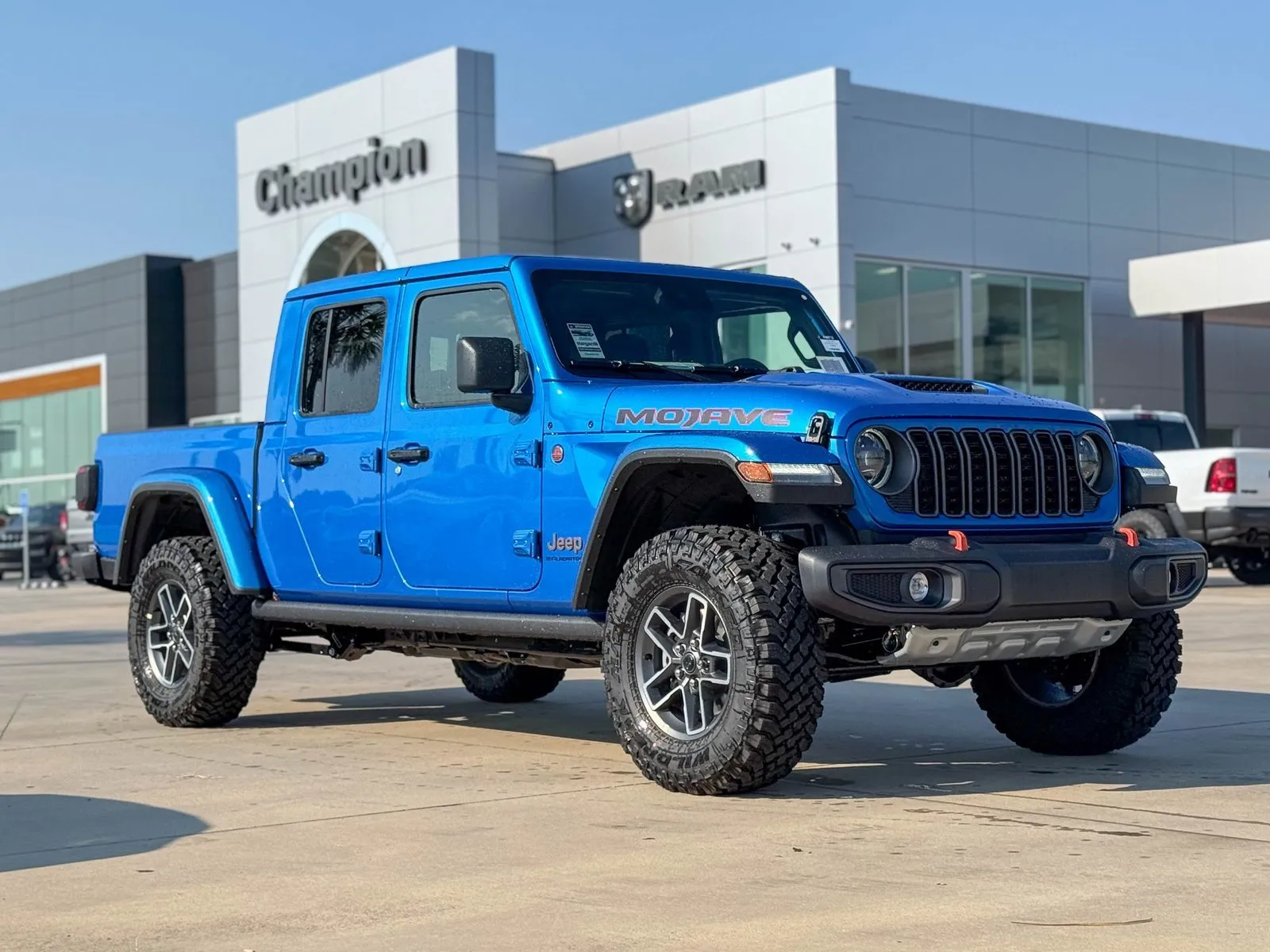 Blue 2025 Jeep Gladiator Mojave for sale in Gulfport, MS