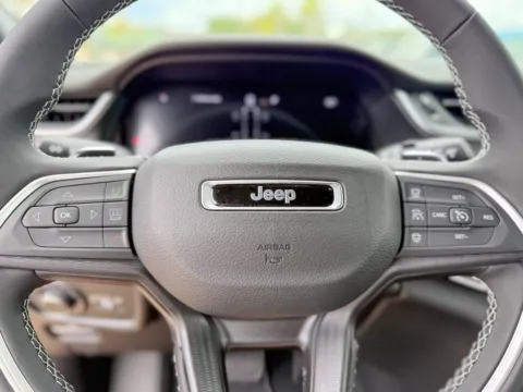 Photos of 2025 Jeep Grand Cherokee L Laredo X for sale in Gulfport, MS at Champion Chrysler Dodge Jeep Ram