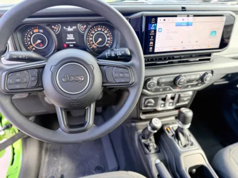 Photos of 2025 Jeep Wrangler Sport for sale in Gulfport, MS at Champion Chrysler Dodge Jeep Ram