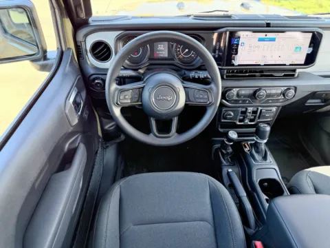 Photos of 2025 Jeep Wrangler Sport for sale in Gulfport, MS at Champion Chrysler Dodge Jeep Ram