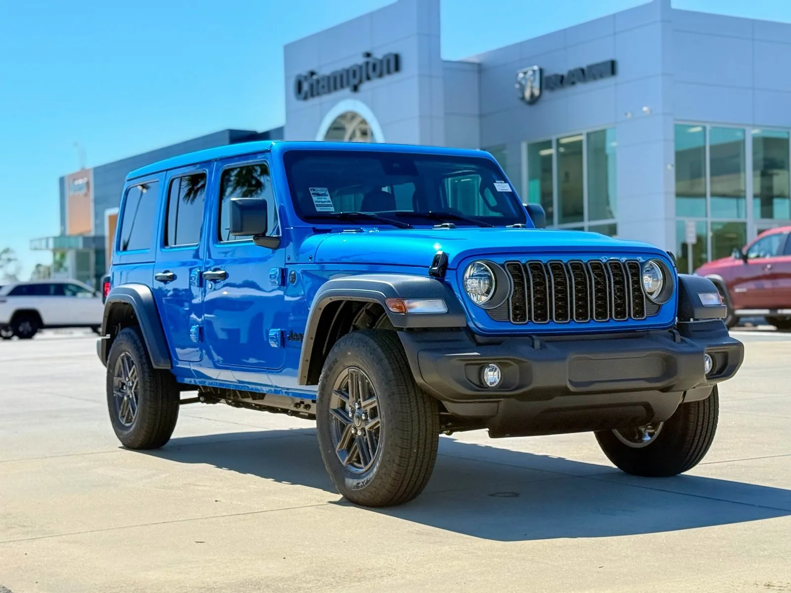 Blue 2025 Jeep Wrangler Sport S for sale in Gulfport, MS