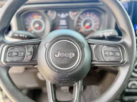 Photos of 2025 Jeep Wrangler Sport for sale in Gulfport, MS at Champion Chrysler Dodge Jeep Ram