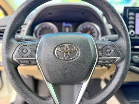 Photos of 2024 Toyota Camry LE for sale in Gulfport, MS at Champion Chrysler Dodge Jeep Ram