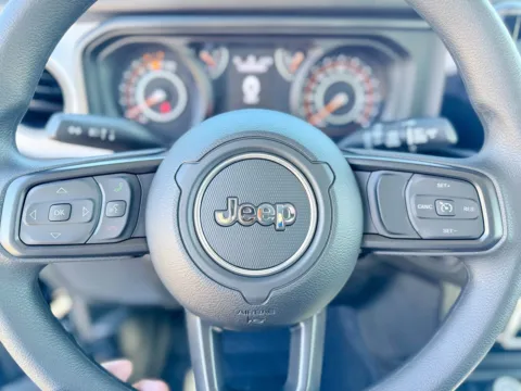 Photos of 2026 Jeep Wrangler Sport for sale in Gulfport, MS at Champion Chrysler Dodge Jeep Ram