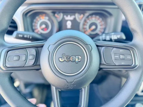 Photos of 2026 Jeep Wrangler Sport for sale in Gulfport, MS at Champion Chrysler Dodge Jeep Ram