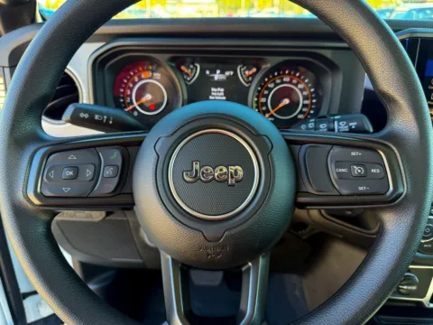 Photos of 2026 Jeep Wrangler Sport for sale in Gulfport, MS at Champion Chrysler Dodge Jeep Ram