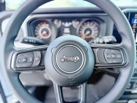 Photos of 2026 Jeep Wrangler Sport for sale in Gulfport, MS at Champion Chrysler Dodge Jeep Ram