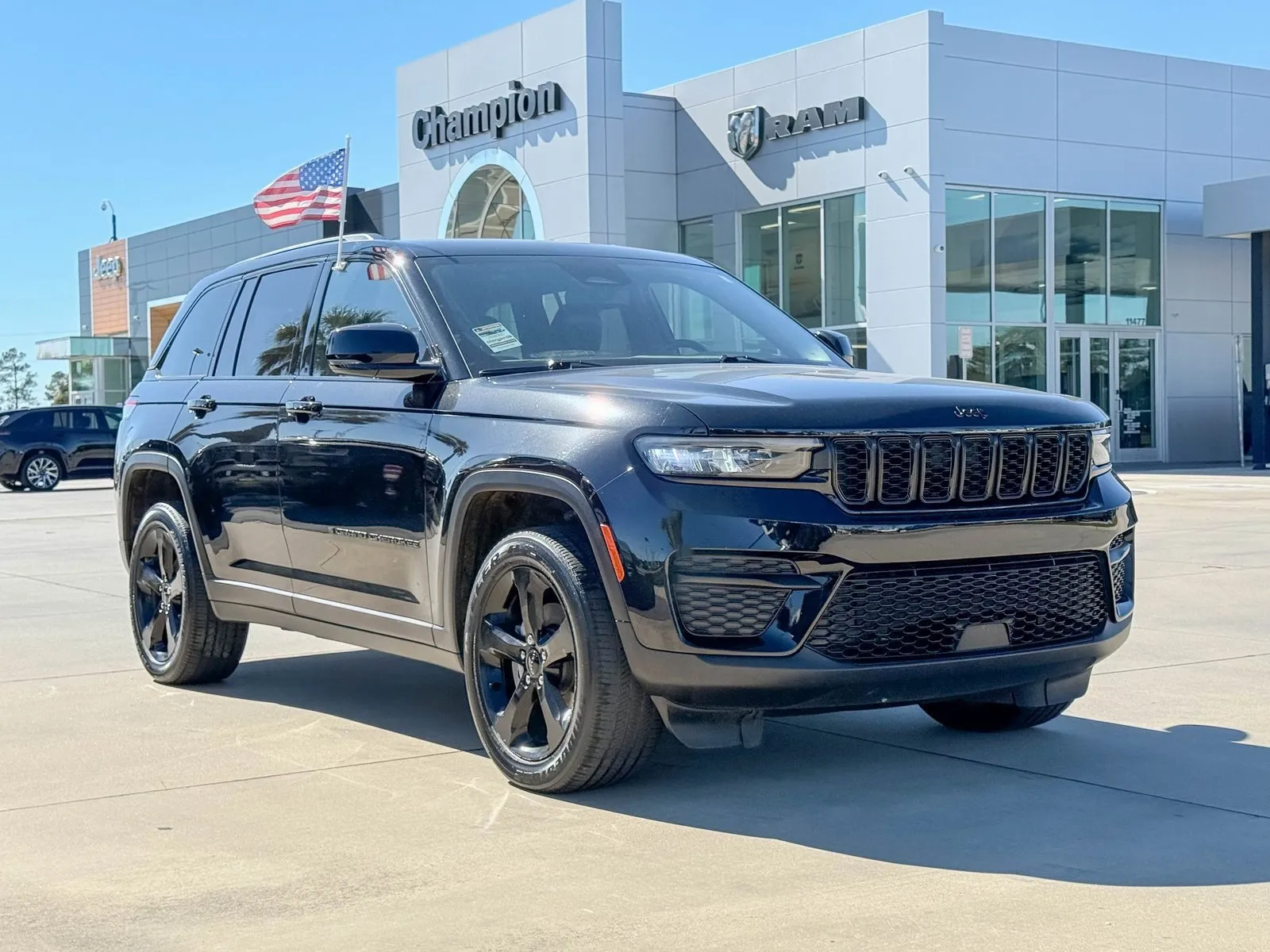 Black 2023 Jeep Grand Cherokee Altitude for sale in Gulfport, MS