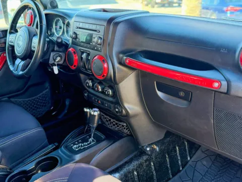 More photos of 2013 Jeep Wrangler Sahara at Champion Chrysler Dodge Jeep Ram, MS