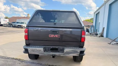 More photos of 2015 GMC Sierra 1500 4WD Crew Cab 143.5" SLT at Dayton Work Trucks, OH