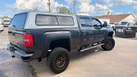 More photos of 2015 GMC Sierra 1500 4WD Crew Cab 143.5" SLT at Dayton Work Trucks, OH