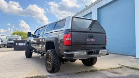 Another view of 2015 GMC Sierra 1500 4WD Crew Cab 143.5" SLT for sale in Dayton, OH at Dayton Work Trucks