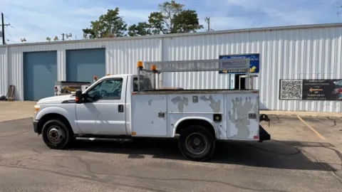 Another view of 2013 Ford Super Duty F-350 DRW 2WD Reg Cab 141" WB 60" CA XLT for sale in Dayton, OH at Dayton Work Trucks