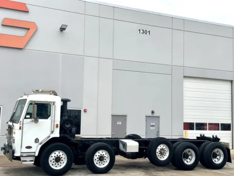 Photos of 2002 PETERBILT 320 for sale in Hutchins, TX at Forge Truck Centers - Texas