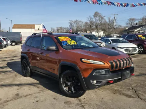 Orange 2016 Jeep Cherokee Trailhawk for sale in Gary, IN