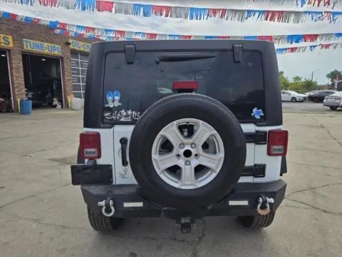 More photos of 2014 Jeep Wrangler Unlimited Sport S at OG Auto Finance, IN