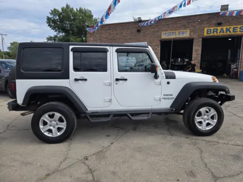 More photos of 2014 Jeep Wrangler Unlimited Sport S at OG Auto Finance, IN