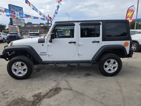 Another view of 2014 Jeep Wrangler Unlimited Sport S for sale in Gary, IN at OG Auto Finance