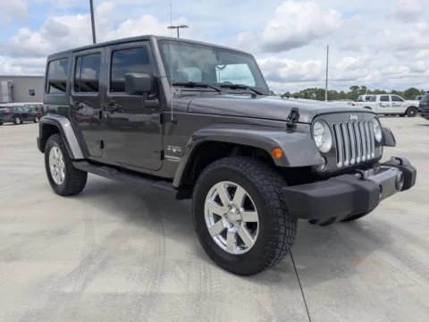 Gray 2016 Jeep Wrangler Unlimited Sahara for sale in Douglas, GA