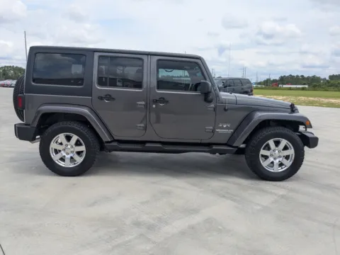 Another view of 2016 Jeep Wrangler Unlimited Sahara for sale in Douglas, GA at Woody Folsom CDJR of Douglas