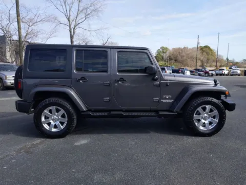 Another view of 2016 Jeep Wrangler Unlimited Sahara for sale in Douglas, GA at Woody Folsom CDJR of Douglas