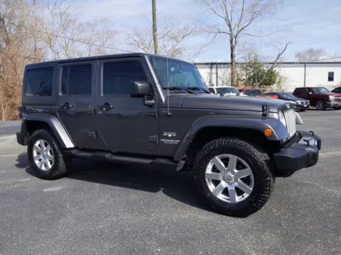 Gray 2016 Jeep Wrangler Unlimited Sahara for sale in Douglas, GA
