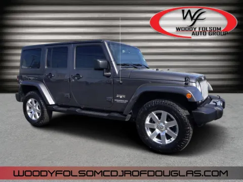 Gray 2016 Jeep Wrangler Unlimited Sahara for sale in Douglas, GA