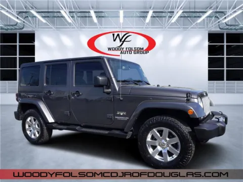 Gray 2016 Jeep Wrangler Unlimited Sahara for sale in Douglas, GA