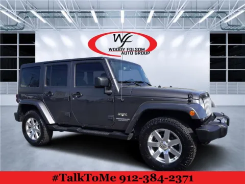 Gray 2016 Jeep Wrangler Unlimited Sahara for sale in Douglas, GA