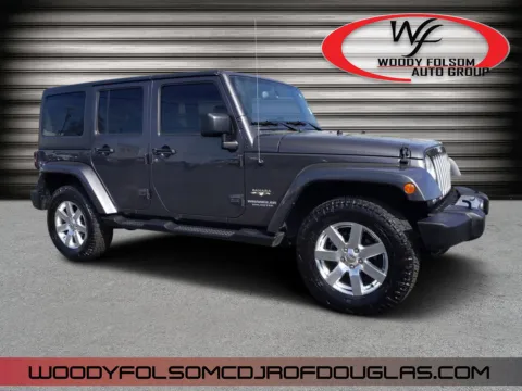 Gray 2016 Jeep Wrangler Unlimited Sahara for sale in Douglas, GA