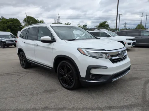 Photos of 2021 Honda Pilot Touring 7-Passenger for sale in Vidalia, GA at Woody Folsom CDJR of Vidalia