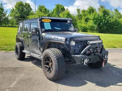 Photos of 2013 Jeep Wrangler Unlimited Sport for sale in Hamilton, OH at Tom Gill Buick GMC