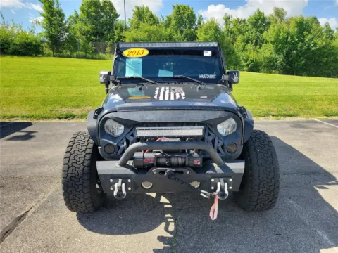 Another view of 2013 Jeep Wrangler Unlimited Sport for sale in Hamilton, OH at Tom Gill Buick GMC