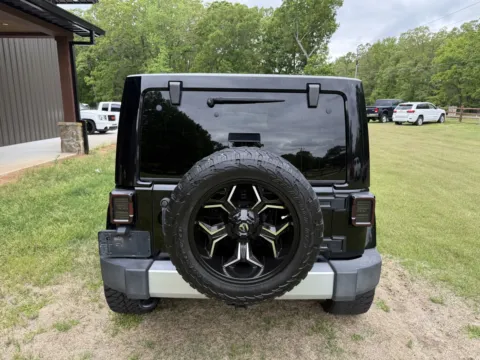 More photos of 2015 Jeep Wrangler Unlimited Sahara at Premier MotorCars LLC, AR