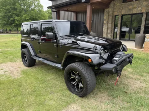 Black 2015 Jeep Wrangler Unlimited Sahara for sale in Austin, AR