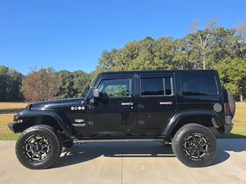 Photos of 2014 Jeep Wrangler Unlimited Sahara for sale in Austin, AR at Premier MotorCars LLC