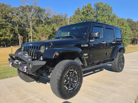 Black 2014 Jeep Wrangler Unlimited Sahara for sale in Austin, AR