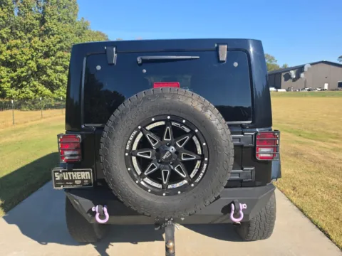More photos of 2014 Jeep Wrangler Unlimited Sahara at Premier MotorCars LLC, AR