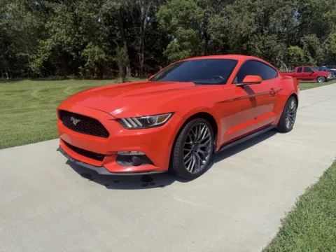 Orange 2015 Ford Mustang for sale in Austin, AR