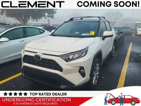 White 2021 Toyota RAV4 XLE Premium for sale in St. Charles, MO
