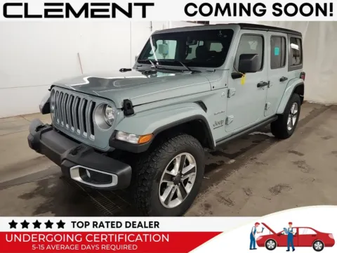 Gray 2023 Jeep Wrangler Sahara for sale in St. Charles, MO