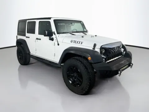 Another view of 2017 Jeep Wrangler Unlimited Willys for sale in St. Charles, MO at Clement Supercenter