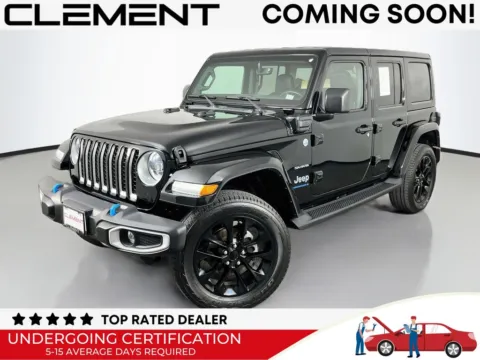 Black 2023 Jeep Wrangler Sahara 4xe for sale in St. Charles, MO