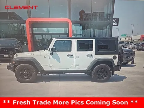 Another view of 2015 Jeep Wrangler Unlimited Willys for sale in St. Charles, MO at Clement Supercenter