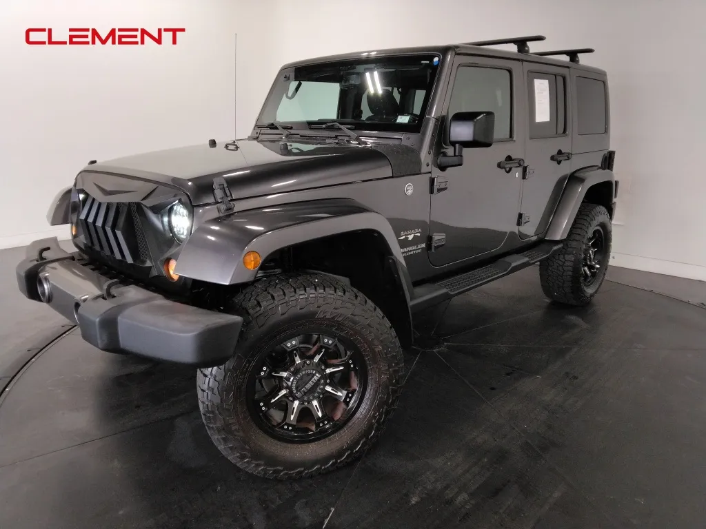 Gray 2016 Jeep Wrangler Unlimited Sahara for sale in St. Charles, MO