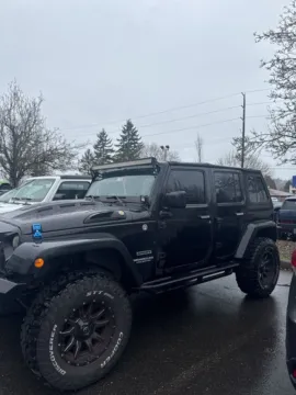 Another view of 2012 Jeep Wrangler Unlimited Sport for sale in Auburn, WA at Bud Clary Auburn CDJR