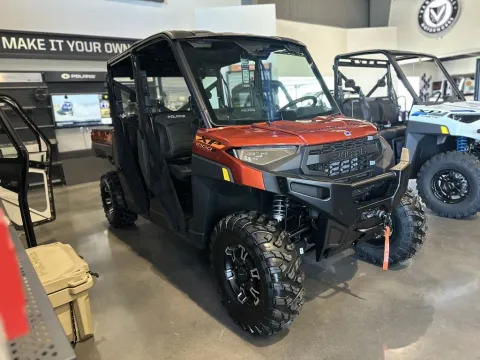 Another view of 2025 Polaris Ranger Crew XP 1000 Premium Orange Rust for sale in Pueblo West, CO at Strictly Powersports